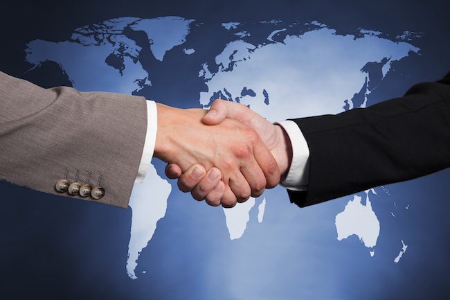 global-handshake-Andrey-Popov-Adobe-650 .jpg